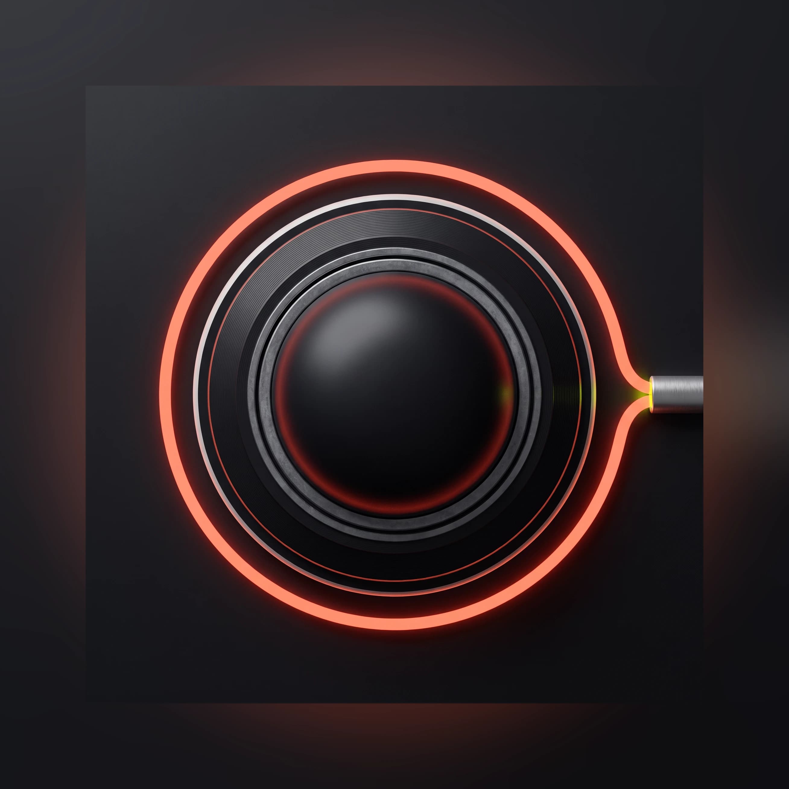 Seen from directly above, the dark module's machined base encircled by an unbroken ring of coral light that never touches it